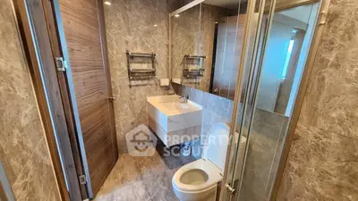 Modern bathroom with sleek design and glass shower enclosure