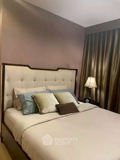 Elegant bedroom with plush bedding and stylish decor