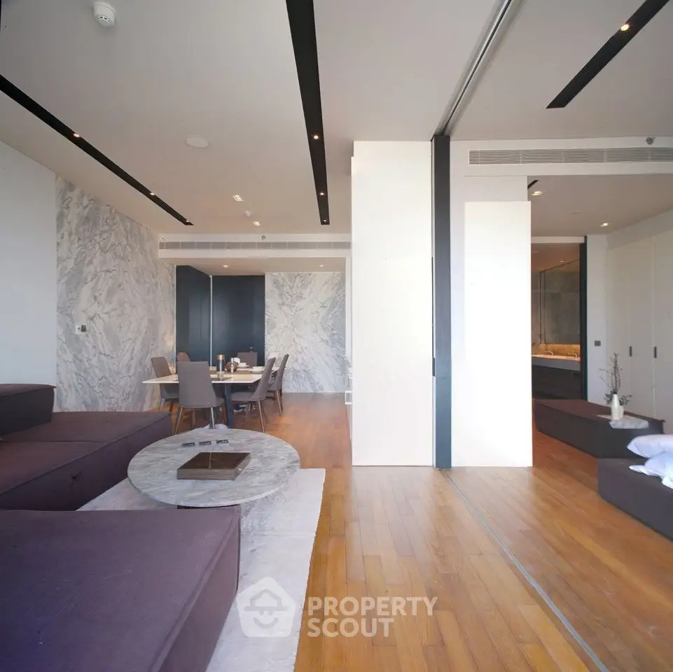 Luxurious modern living room with elegant dining area and stylish decor