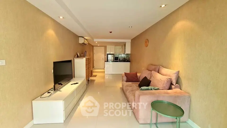 Spacious living room with modern decor and cozy seating area