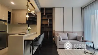 Modern living room with sleek kitchen and cozy sofa in open layout apartment