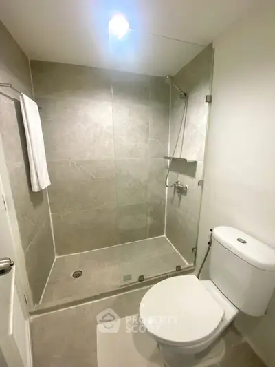 Modern bathroom with glass shower and sleek design