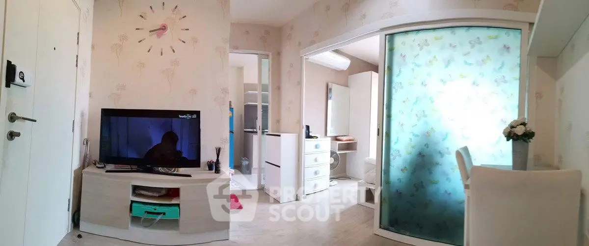 Charming studio apartment with modern decor and frosted glass partition
