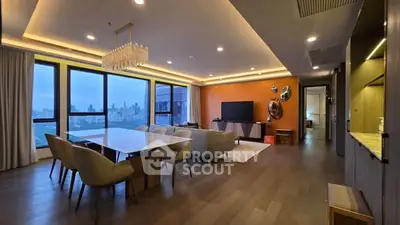 Luxurious modern living room with city view, elegant dining area, and stylish decor.