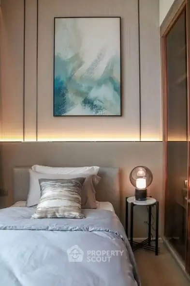 Cozy modern bedroom with elegant decor and ambient lighting