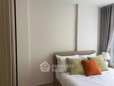 Cozy bedroom with modern decor and natural light