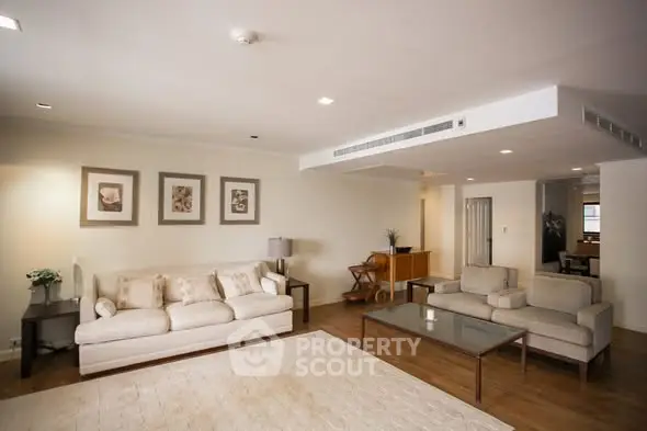 Spacious modern living room with elegant decor and comfortable seating