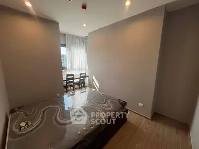 Cozy bedroom with natural light and modern decor