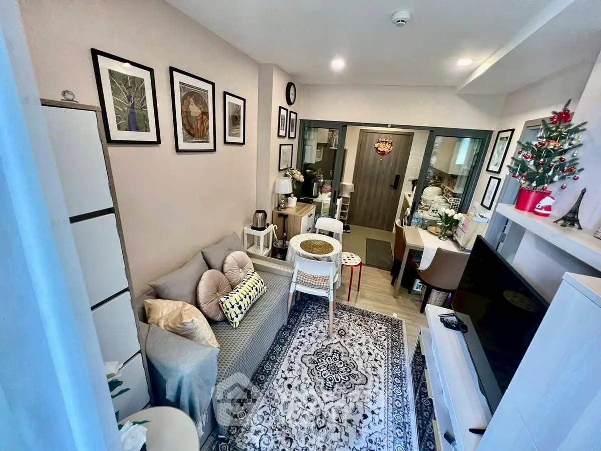 Charming living room with cozy decor and modern furnishings, perfect for relaxation and entertaining.