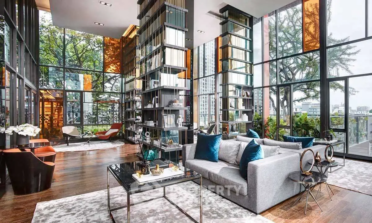 Luxurious modern living room with floor-to-ceiling windows and elegant decor in urban setting.