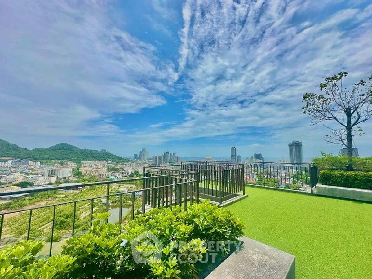 Stunning rooftop garden with panoramic city views and lush greenery