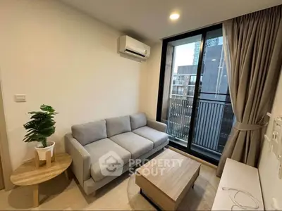 Modern living room with cozy sofa and city view balcony