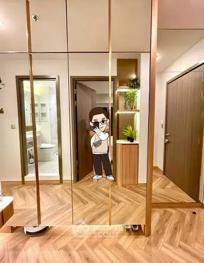 Stylish modern hallway with mirrored closet doors and wooden flooring