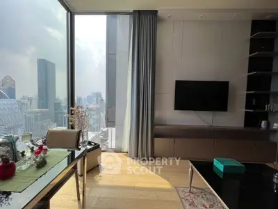Luxurious living room with stunning city view, modern decor, and elegant furnishings in a high-rise apartment.