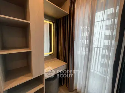 Modern bedroom with built-in vanity and sheer curtains