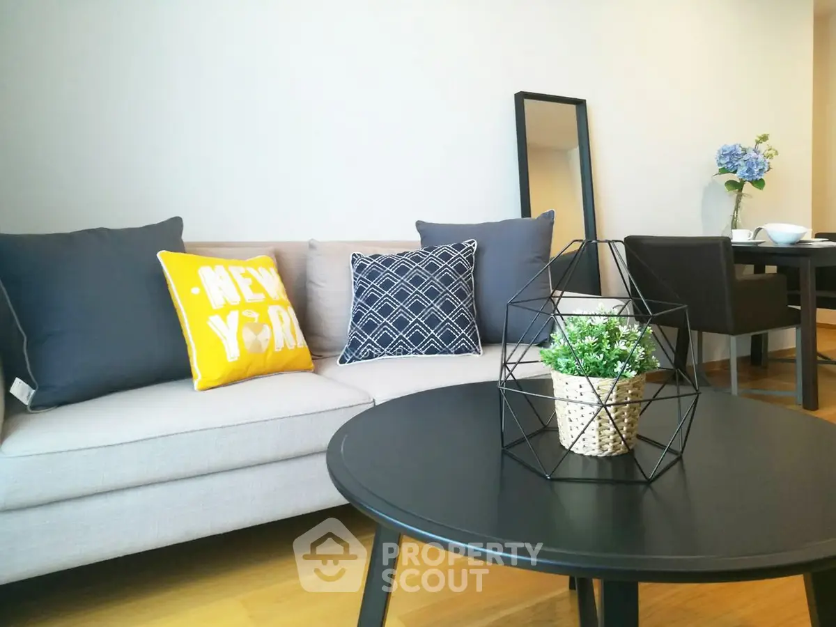 Modern living room with stylish decor and cozy seating area