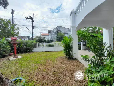 Charming garden view with lush greenery and spacious outdoor area in a serene neighborhood.