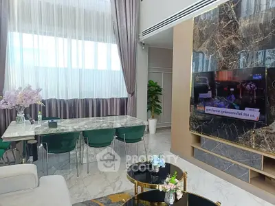 Luxurious modern living room with marble accents and elegant decor