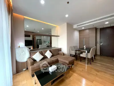 Spacious modern living room with elegant dining area and stylish decor