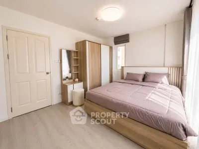 Modern bedroom with elegant wooden furniture and soft lighting