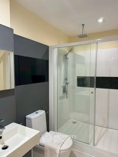 Modern bathroom with sleek shower and contemporary fixtures