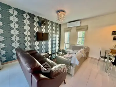 Stylish living room with modern decor and elegant chandelier