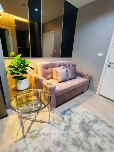 Cozy living room with plush sofa and modern decor in stylish apartment