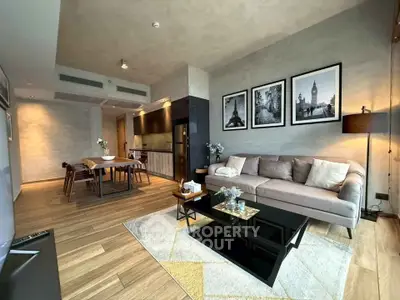Modern living room with stylish decor and open kitchen layout