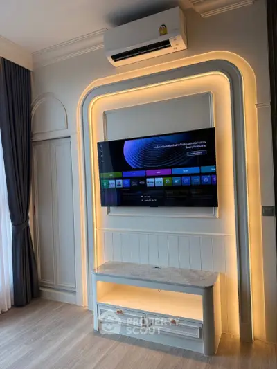 Modern living room with stylish TV setup and ambient lighting