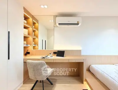Modern bedroom with built-in desk and stylish decor