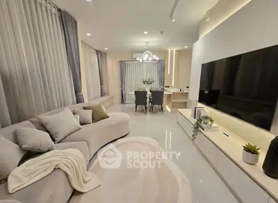 Luxurious modern living room with elegant decor and spacious dining area