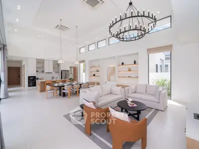 Luxurious open-plan living room with high ceilings and elegant decor