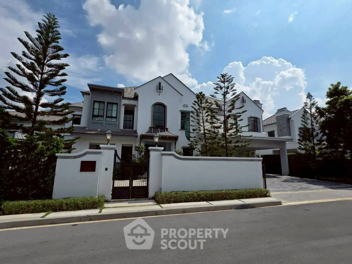 Luxurious modern villa with elegant facade and lush landscaping