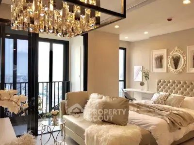 Luxurious bedroom with elegant decor and city view balcony