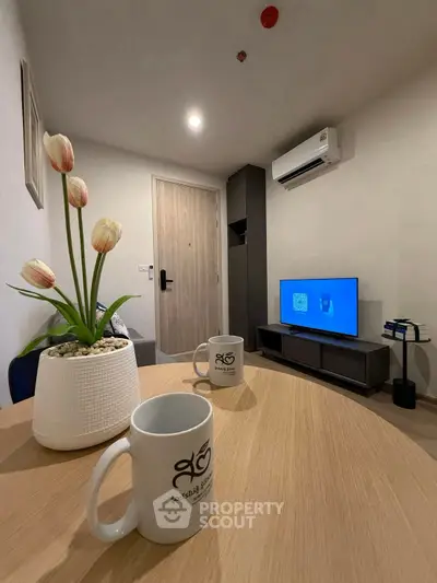 Modern living room with stylish decor and air conditioning