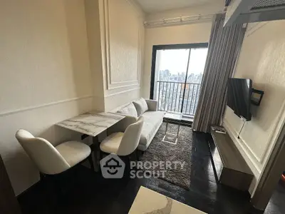 Modern living room with city view, featuring sleek furniture and elegant decor.