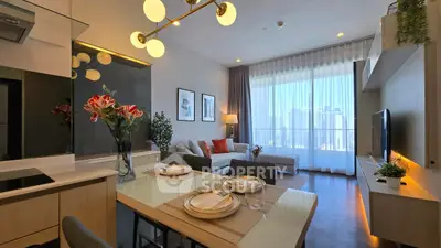 Modern open-plan living room with dining area and city view, featuring elegant decor and natural light.