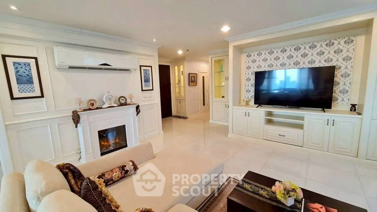 Luxurious living room with elegant decor and large TV