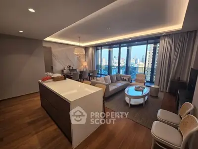 Luxurious open-plan living room with city view, modern furniture, and elegant lighting.