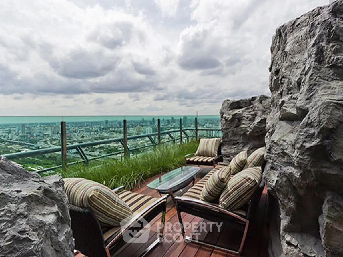 Stunning rooftop terrace with panoramic city views and stylish outdoor seating.