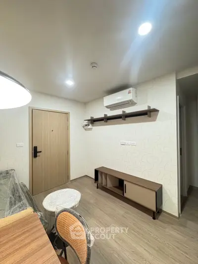 Modern apartment interior with stylish furniture and air conditioning
