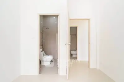 Minimalist bathroom with modern fixtures and sleek design, perfect for contemporary living.