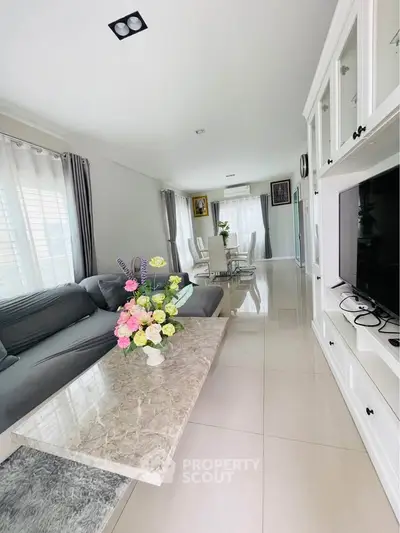Spacious living room with elegant decor and modern furnishings
