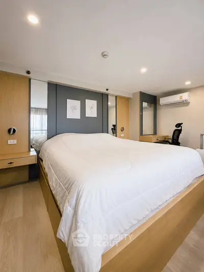 Spacious modern bedroom with elegant design and natural light
