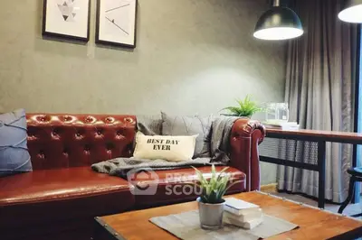 Stylish living room with leather sofa and modern decor, perfect for cozy evenings.