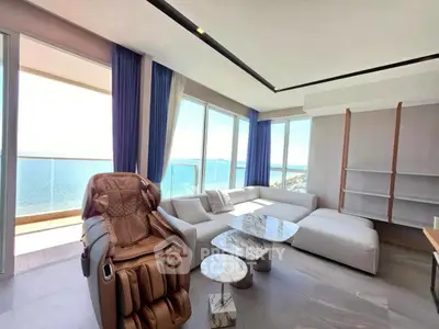 Luxurious living room with stunning ocean view and modern furniture