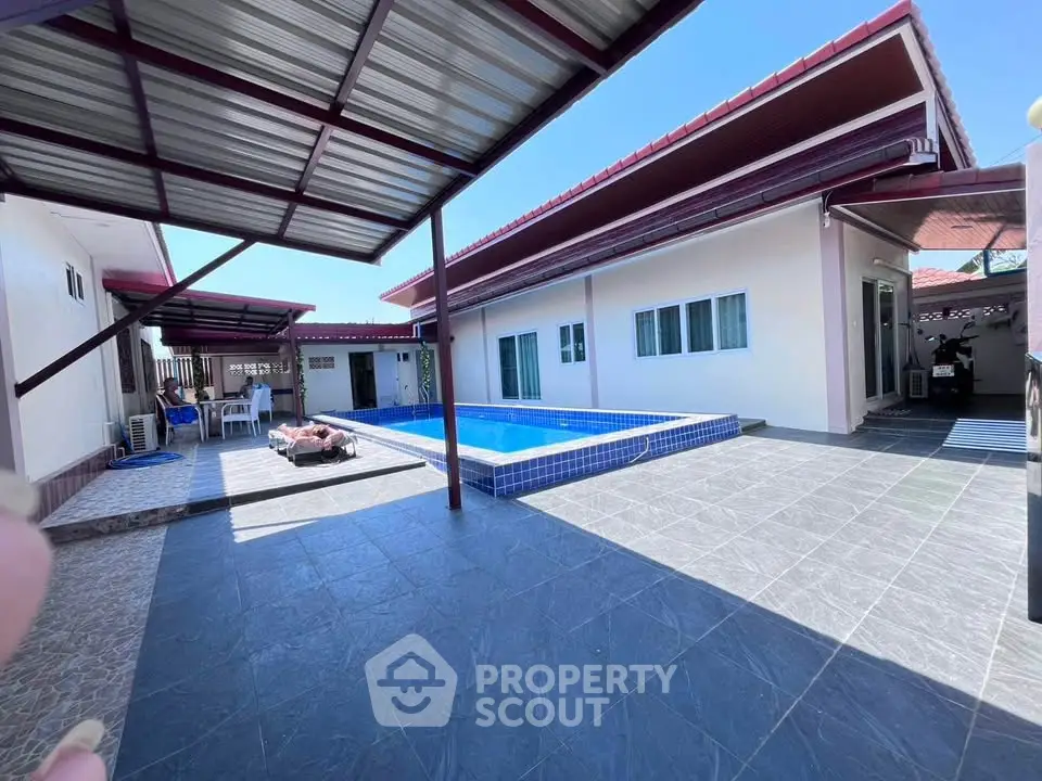 Spacious outdoor area with private pool and modern design, perfect for relaxation and entertainment.