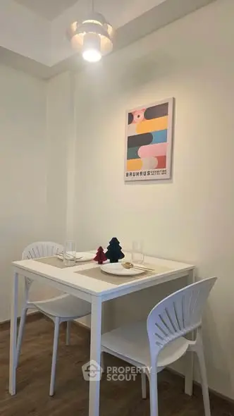 Cozy dining nook with modern decor and stylish lighting