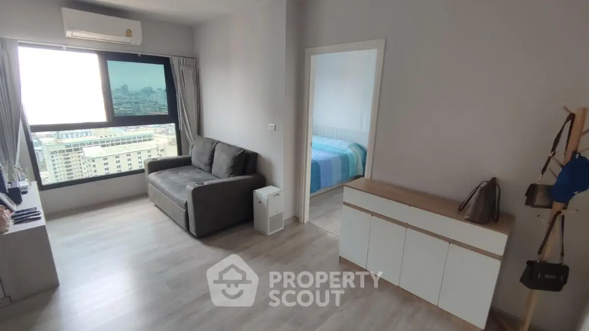 Modern apartment living room with city view and stylish furniture