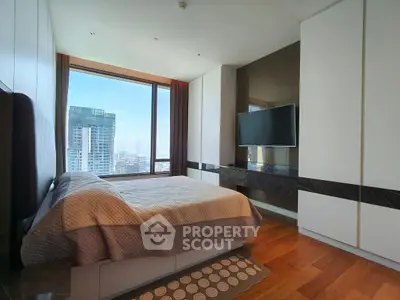 Luxurious bedroom with stunning city view and modern furnishings